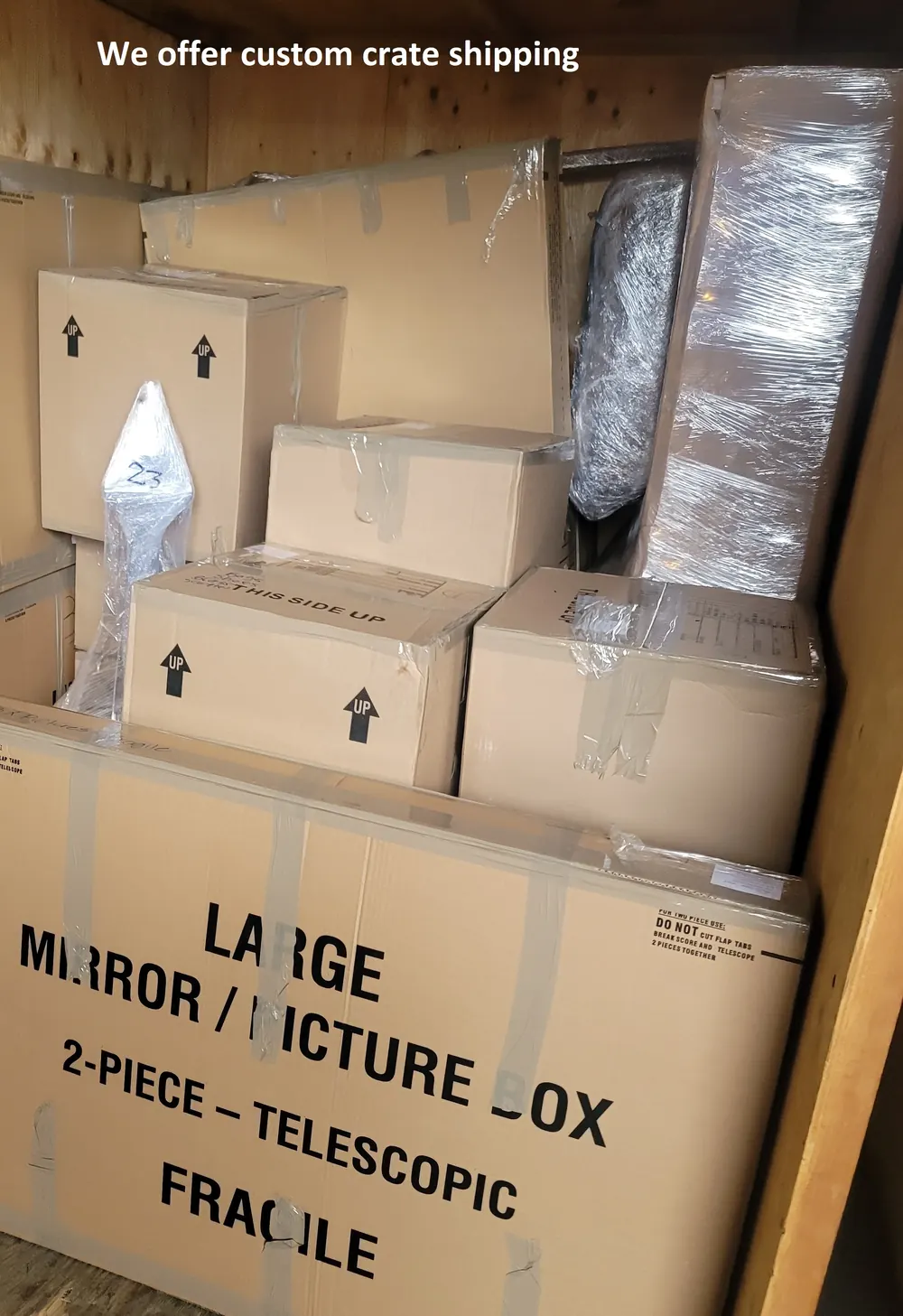 Custom crate and packed household goods staged for container shipping