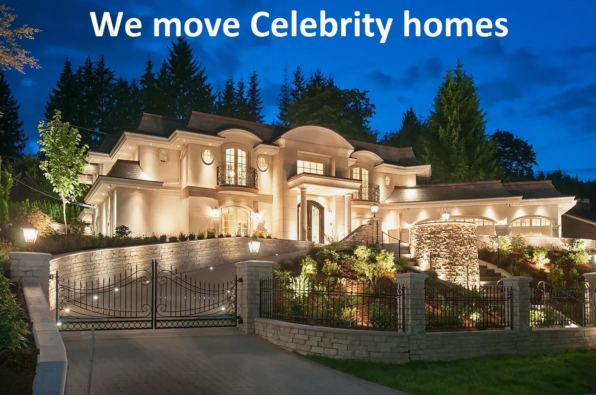 1Pro crew carrying wrapped furniture into a high-end Metro Vancouver home